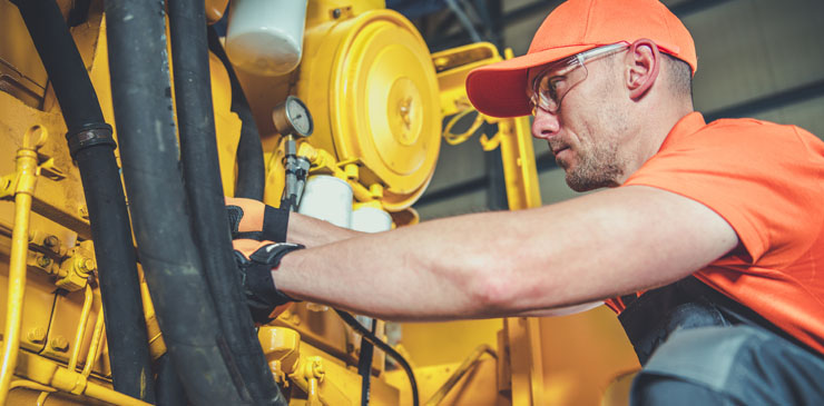 service technician working on equipment 